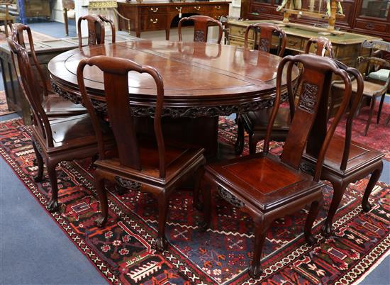 A Chinese rosewood circular dining table & 10 chairs W.170cm